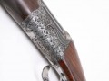 Round action over and under with full scroll engraving